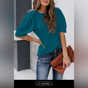 Short Sleeve Blouse, Crew Neck Casual lake blue size 12 / XL never worn.